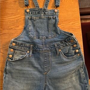 Jean overalls.  Frayed cuff.  Size 2